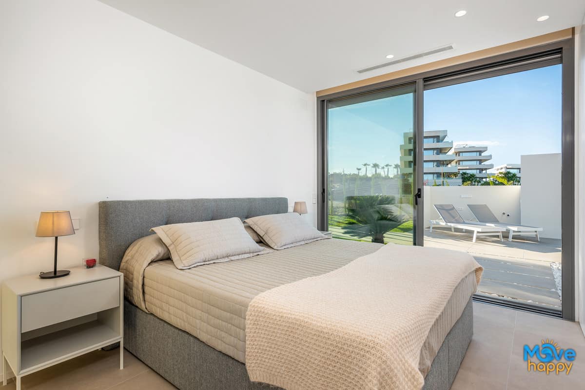 property-for-sale-las-colinas-golf-villa-bright-patio-bedroom-patio-doors