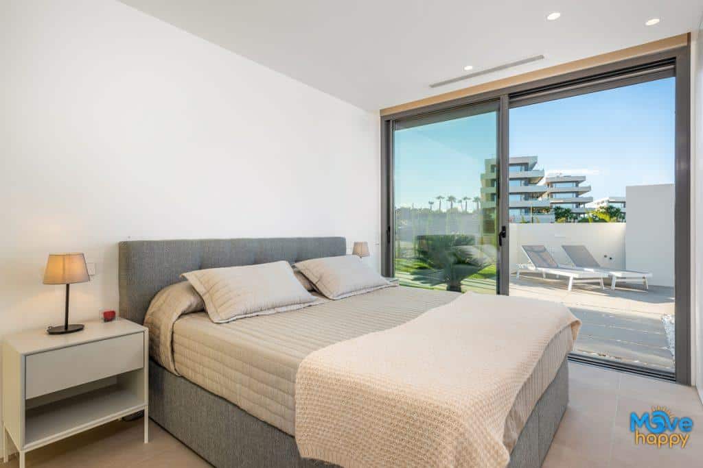 property-for-sale-las-colinas-golf-villa-bright-patio-bedroom-patio-doors-2.jpg